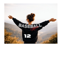 Person wearing a 'Baseball 12' jacket with arms outstretched on a scenic background