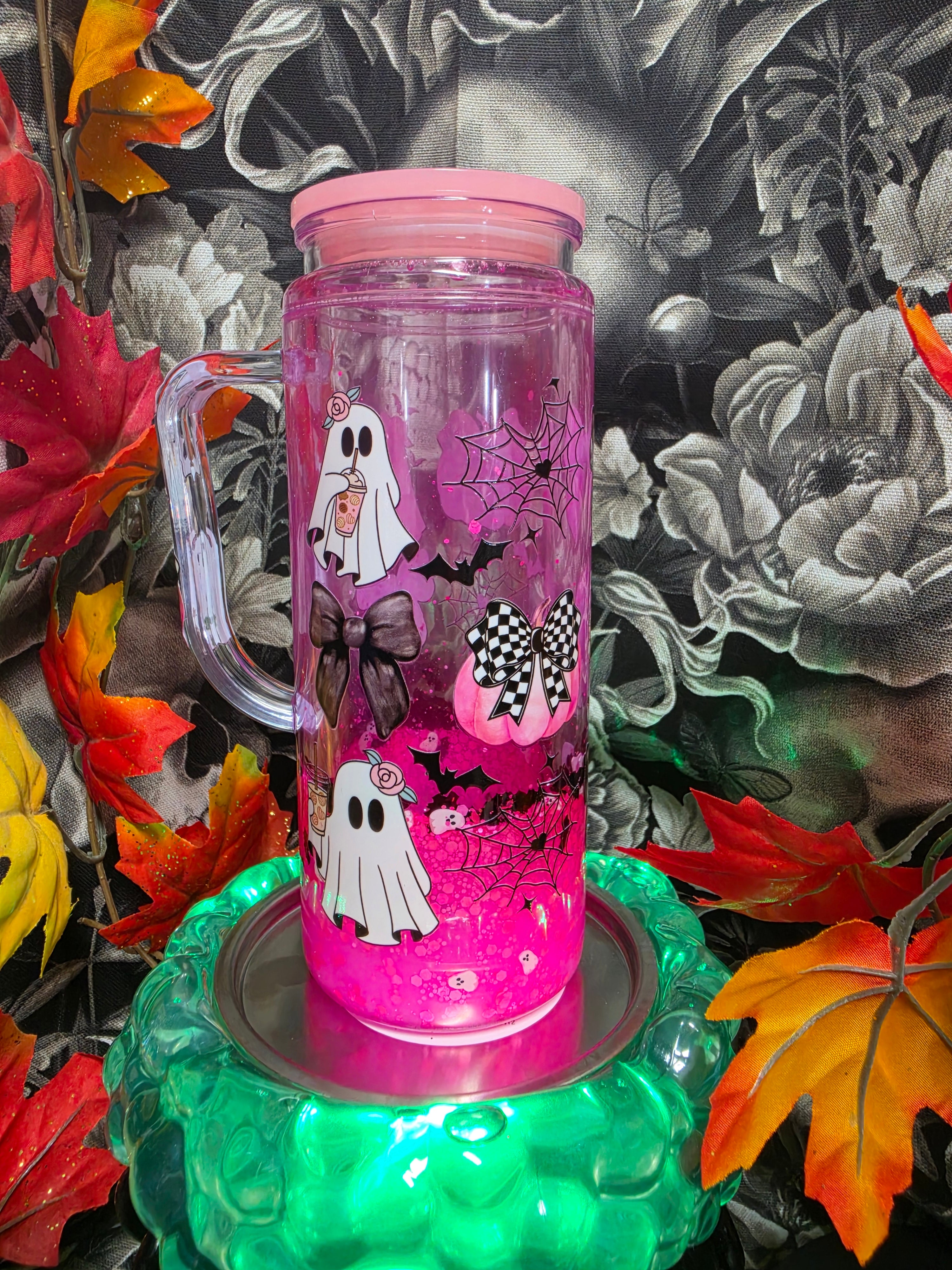 Hot Pink pumpkins and ghosts 20  oz snow globe Tumbler