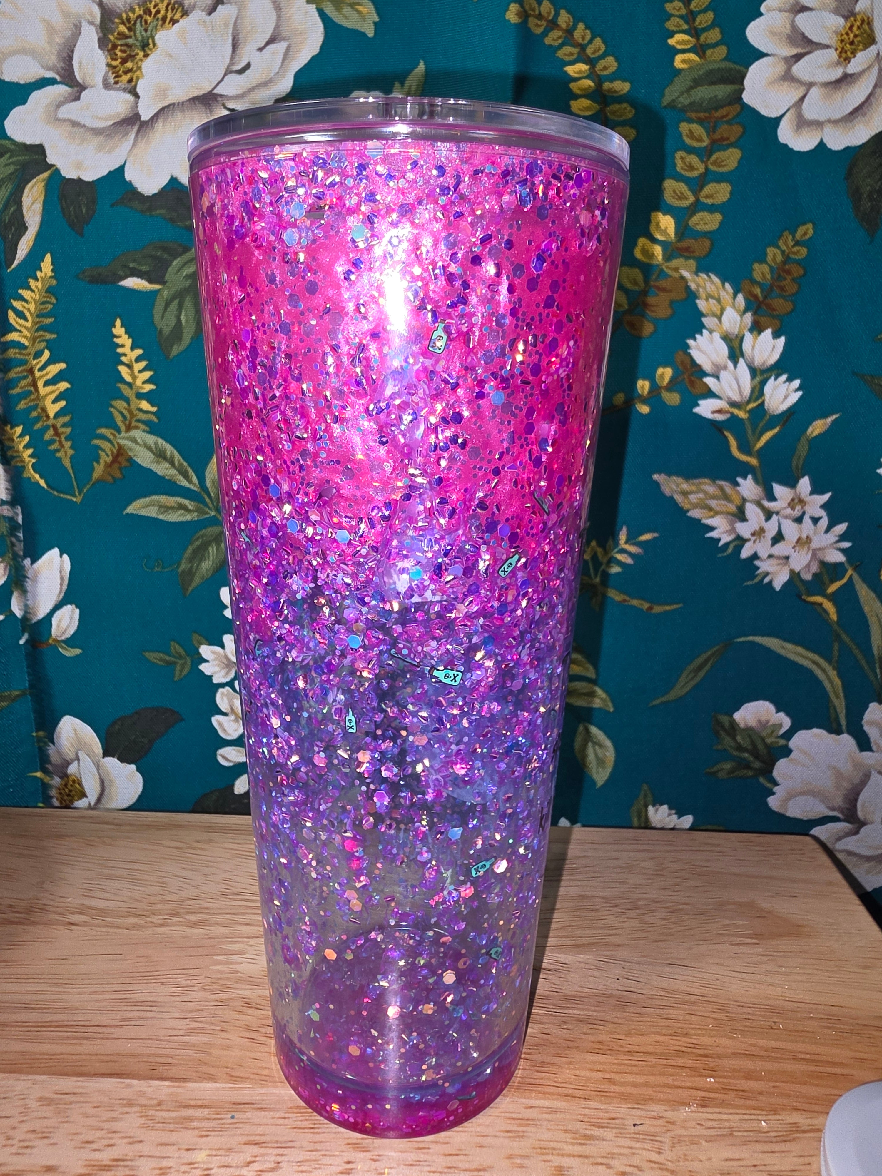 Glow in the dark poison with pink lava and colorful glitter. 20oz snowglobe tumbler