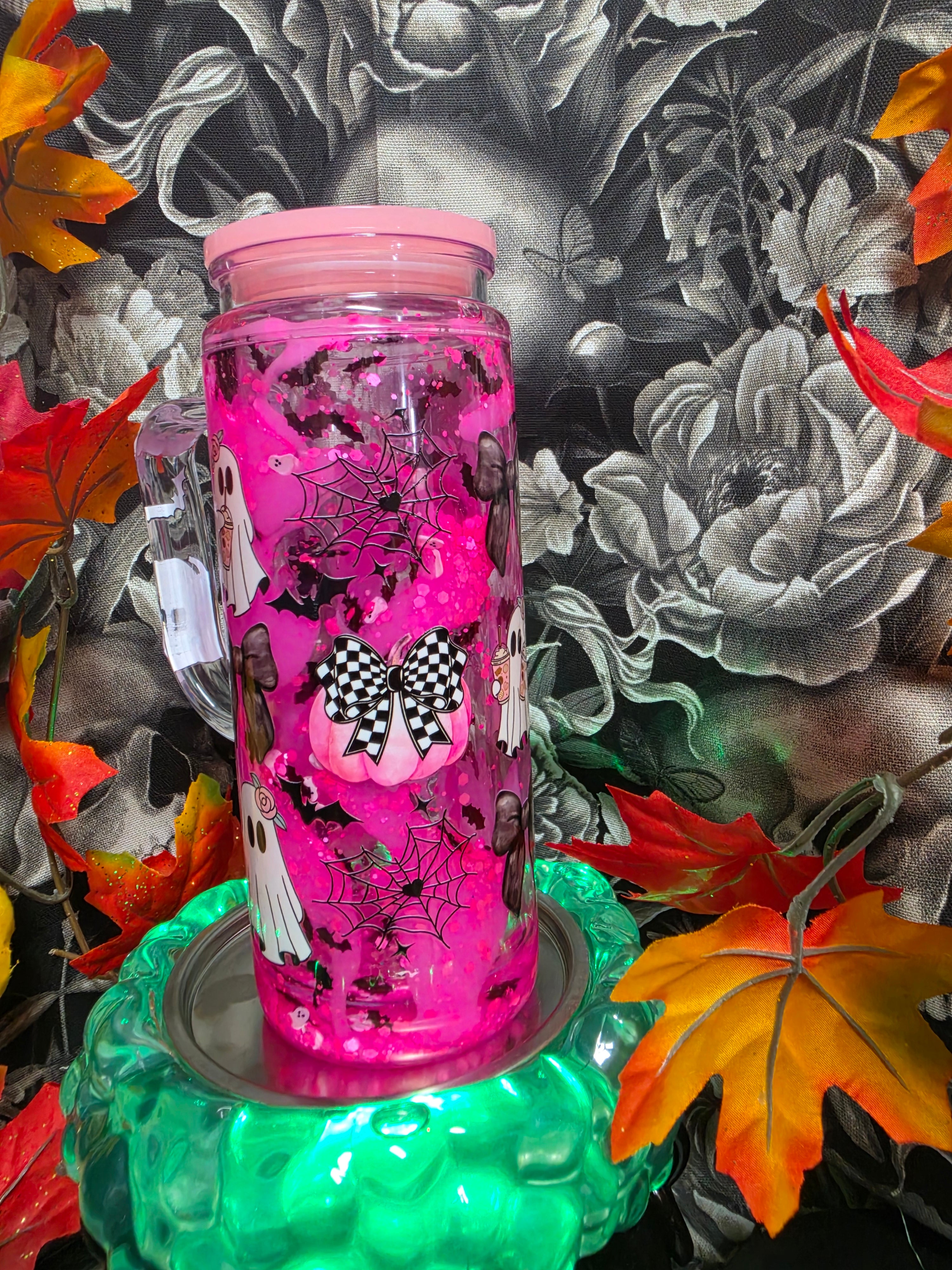Hot Pink pumpkins and ghosts 20  oz snow globe Tumbler