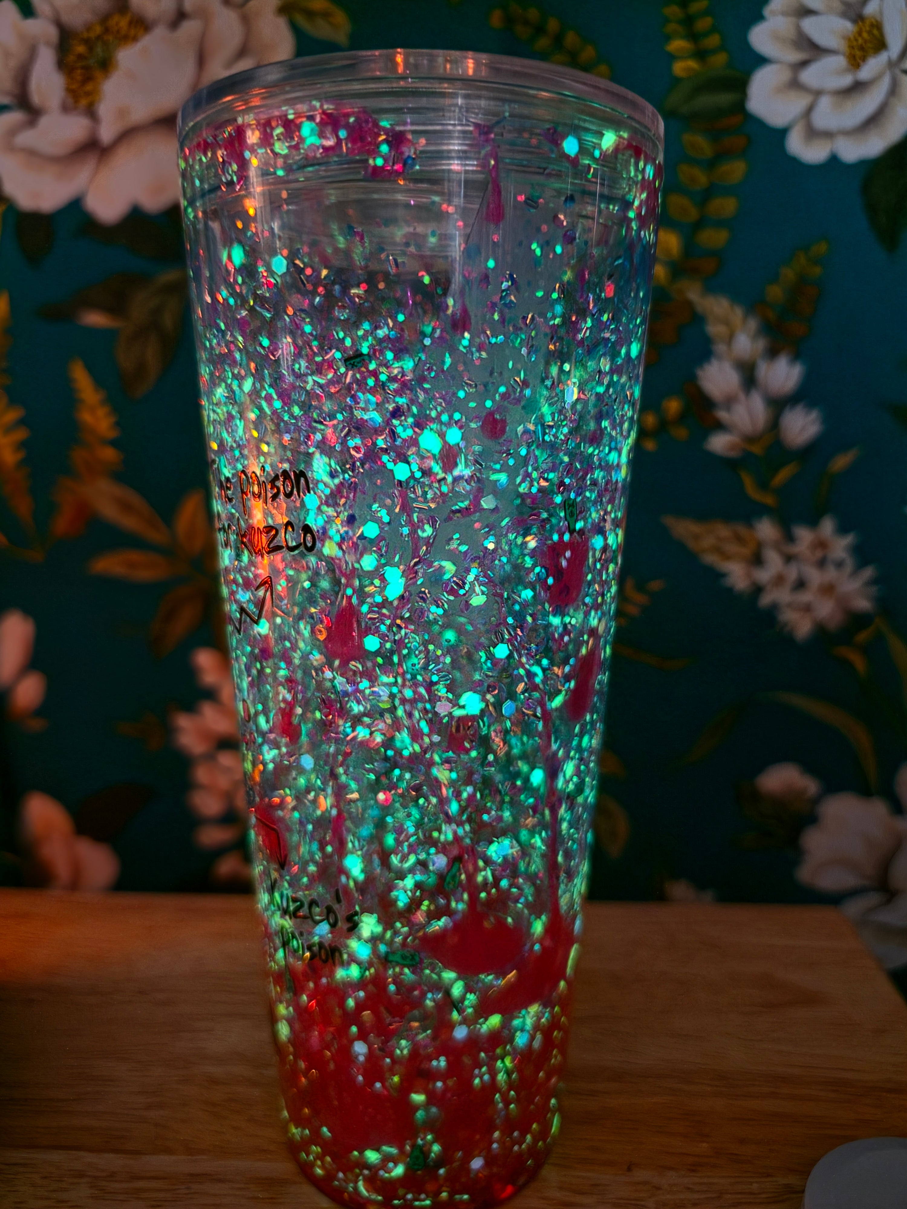 Glow in the dark poison with pink lava and colorful glitter. 20oz snowglobe tumbler